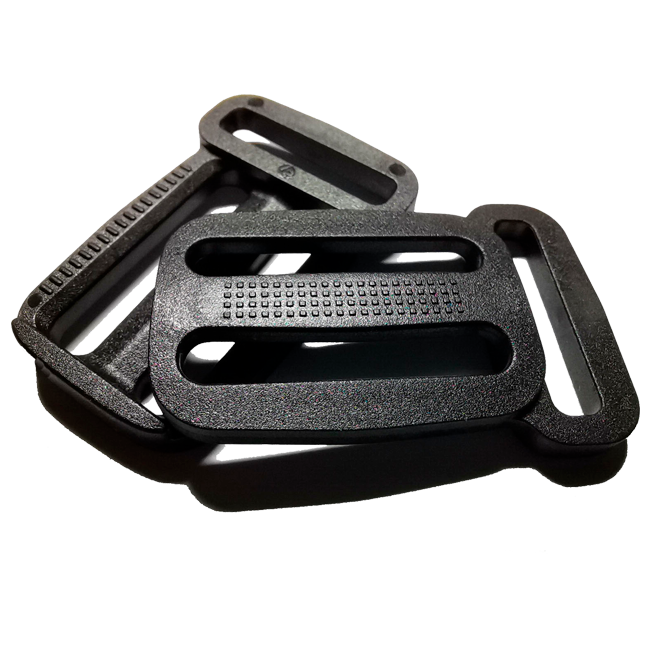 Пряжка пластиковая двухщелевая с ушком Пряжка пластиковая двухщелевая с ушком